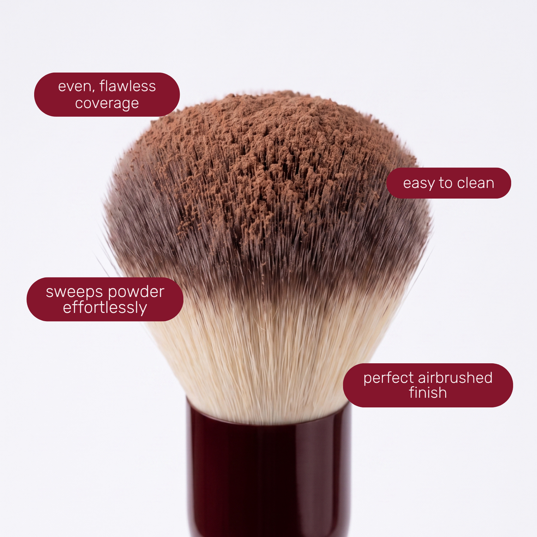 Brush head of the Boozyshop Flawless Powder Brush with text labels about how to use it