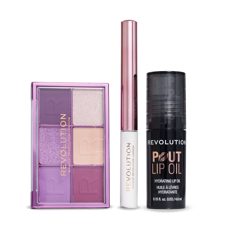 Contents of the After Dark Giftset: purple palette, white eyeliner and Pout Lip Oil